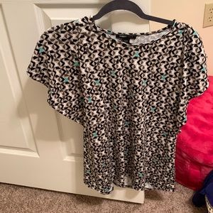 Lightly worn as a dress shirt